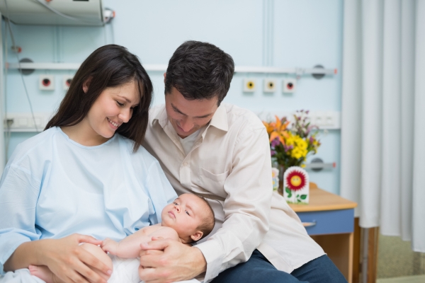 parents with new born baby 