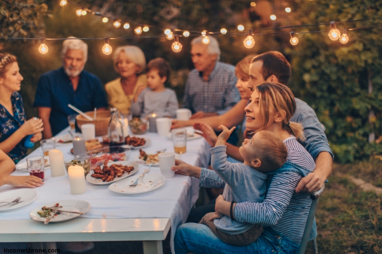 family on food table