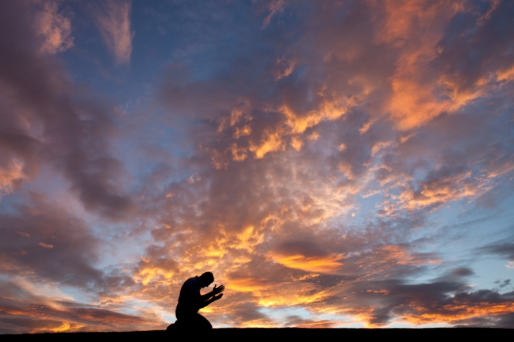 man keeping prayer